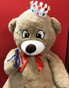 Teddy with crown and celebration stick